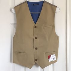 Izod Kaki Button Up Lined Vest Youth/Jrs Sz 18-20 Xl New With Tags. Check Measurements For Fit. *****Bundle Two Or More Items And Save 15% And Pay Shipping For One Item. ( Items Will Ship Together.)***** Measures Approximately: 18” Underarm Seam To Underarm Seam 36” Bust With A Bit Of Stretch With Cotton Spandex Outer And Adjustable Back Strap 22” Top Back Collar Seam To Lower Front At Lowest Cotton Button-up Vest, Cotton Button-up Vest With Buttons, Casual Beige Vest With Buttons, Beige Casual Vest With Buttons, Sleeveless Cotton Outerwear With Button Closure, Brown Cotton Vest With Buttons, Beige Cotton Vest With Button Closure, Spring Cotton Vest With Buttons, Casual Beige Vest With Button Closure