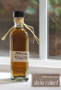 a bottle of extra virgin olive oil sitting on a window sill