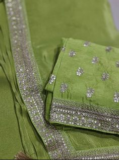 1.this is beautiful tissue sari with designer border with embroidered blouse piece  2.this sari is 5.5 mt length  3.this is a very elegant looking sari for all occasions like weddings and other formal events  4.fall n pico is complimentary  5.blouse can be made as per the requirements of the clients with proper measurements.stiching charges will be extra 6.plz check the availability of the sari before placing the order Green Art Silk Pre-draped Saree With Embroidered Border, Elegant Pre-draped Saree With Embroidered Border For Wedding, Designer Green Pre-draped Saree With Embroidered Border, Elegant Semi-stitched Pre-draped Saree With Embroidered Border, Transitional Festive Pre-draped Saree With Embroidered Border, Festive Green Pre-draped Saree With Embroidered Border, Festive Pista Green Chanderi Pre-draped Saree, Designer Pre-draped Dola Silk Saree With Dupatta, Festive Silk Pre-draped Saree With Mirror Work