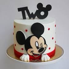 a mickey mouse birthday cake with the number two on it's top and ears