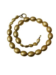 This versatile four-strand necklace can be detached and worn alone or in combination.  The beads are oval in antique gold, and the clasp is two carabines for easy opening and closing.  The longest strand is 42 inches; combined strands weigh 32 ounces.  Wearing all four strands makes a showpiece, and wearing only one makes a unique look.  You can order one strand at no additional cost and specify the length. Gold Multi-strand Jewelry With Polished Beads, Elegant Brass Beaded Necklaces, Elegant Bronze Oval Necklace, Elegant Oval Bronze Necklace, Elegant Multi-strand Brass Jewelry, Classic Gold Multi-strand Necklace, Gold Multi-strand Large Beaded Jewelry, Elegant Multi-strand Necklaces With Spacer Beads, Elegant Brass Jewelry With Polished Beads