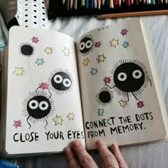 someone is holding an open book with cartoon eyes and stars on it, which reads close your eyes the dots from memory