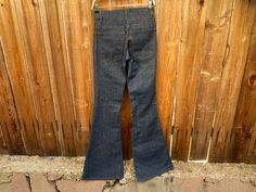 "Levi's original vintage 684 jeans.   Made in USA in the 1981.  Factory code #532. Rigid 100% cotton denim in rigid wash.  Should shrink approximately 3% with laundering.  Orange tab.  Mid-rise.  Deadstock condition. No original tags. There is some scuffing running down the back leg (from storage) which looks like it's a bit of dirt but also a little bit of color loss. Also a couple other spots of minor scuffing which give them a bit of dustiness but also maybe just a hint of color loss. So they Retro Stretch Flare Jeans, Vintage High Rise Stretch Flare Jeans, Vintage Stretch High Rise Flare Jeans, Vintage High Waist Stretch Flare Jeans, Vintage Stretch Denim Blue Jeans, Vintage Stretch Jeans In Medium Wash, Vintage Stretch Mid-rise Jeans, Retro Medium Wash Bottoms With Standard Cut Leg, Vintage High Rise Stretch Jeans