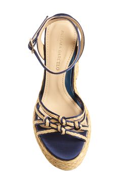 Soft indigo satin and braided raffia distinguish this elegant platform sandal with knotted vamp straps and a nonslip sole. 5 heel, 2" platform (size 39) Adjustable ankle strap with buckle closure Textile and raffia upper/leather lining/leather and synthetic sole Made in Spain Designer Shoes Elegant Open Toe Straw Espadrilles, Elegant Platform Espadrilles For Vacation, Elegant Ankle Strap Espadrilles For Vacation, Elegant High Heel Espadrilles For Vacation, Elegant Sandals With Ankle Strap And Woven Sole, Elegant Ankle Strap Sandals With Woven Sole, Elegant Wedge Sandals With Woven Sole And Ankle Strap, Elegant Platform Espadrilles With Ankle Strap, Paloma Barcelo