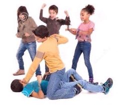 four children are playing with each other on the floor