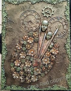 this is an art work made out of clay and metal with flowers, gears, and other things on it