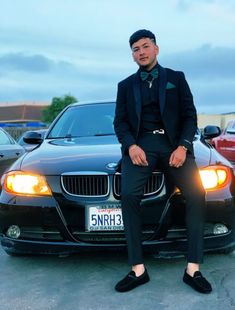 Green Prom Fits Men, Emerald Green Wedding Men, Black Tuxedo With Emerald Green Tie, Tuxs For Prom, Dark Green And Black Prom Couple, Green Prom Tuxedo Ideas, All Black Suit With Emerald Green Tie, Black Suit Emerald Green Bow Tie, Black Suits With Emerald Green Tie