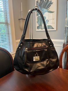 Black crock patterned faux leather hobo style bag with and silver hardware and double handles made by mac&jac. Front of bag has 1 large zipper pocket. Roomy open interior with black fabric lining, magnetic button closure, 1 wall zip and 2 slide in wall pockets. Measures 14"W x 11"T with a 8" strap drop. This is a large size stylish bag in excellent condition with no rips or tears and a clean lining. If you are seeing higher than expected shipping fees at checkout, please reach out and I will see Handheld Satchel With Silver-tone Hardware For Everyday Use, Everyday Handheld Satchel With Silver-tone Hardware, Everyday Use Handheld Satchel With Silver-tone Hardware, Everyday Double Handle Hobo Bag With Silver-tone Hardware, Silver-tone Double Handle Hobo Bag, Shopping Hobo Bag With Metal Hardware And Double Handle, Everyday Handheld Shoulder Bag With Silver-tone Hardware, Double Handle Hobo Bag With Metal Hardware For Shopping, Everyday Use Handheld Shoulder Bag With Silver-tone Hardware