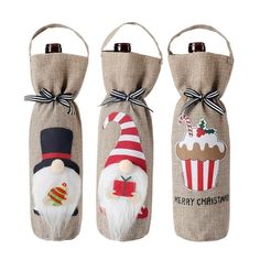 three bottles with christmas decorations on them and one has a santa clause, the other is a snowman