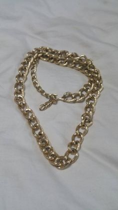 Gold Toned, Curb Chain, 32 inch Necklace, Costume Jewelry, Fashion Accessory This is a great find and priced to sell.  Very decorative. Check out our shop for monthly specials. We have a variety of items for every taste. Combine several of our items together to save on shipping. If you have any questions please do not hesitate to ask. I will ship outside of the US, just request a quote. Happy Shopping. I will work around the priority mail price. Just send me your zip code and I will get a quote. As shop owners we will do our best to describe any issues or problems with our items. Since we do sell vintage and antiques there may be some flaws. Please check out the pictures very carefully and feel free to ask any questions. All sales are final. With any glass items, we price the item to be sh Gold-tone Metal Chain Necklace For Jewelry Making, Gold Long Necklace With Metal Chain Style, Vintage Long Chain Necklace With Lobster Clasp, Gold-tone Metal Long Chain Necklace, Gold-tone Long Metal Chain Necklace, Vintage Metal Snake Chain Necklace, Vintage Gold Necklace With Chain Strap, Vintage Snake Chain Necklace, Quote Happy