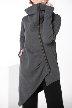 "Gray Asymmetric Coat, High Collar Jacket, Women Sweatshirt Coat Express Shipping to the USA, UPS Courier for free Delivery 3-5 Business Days Thanks for your love for the Sweatshirt ♥ A few words about this product... Asymmetric zip up sweatshirt. A big, capacious side pocket. Expressly asymmetrical cut. Sweatshirt made of: 90% cotton 10% polyester Good quality, soft fabric which stretches slightly to fit your body and is therefore very comfortable to wear. Sweatshirt sewn using traditional tech Winter Outerwear With Asymmetrical Side Zipper, Winter Long Sleeve Outerwear With Side Zipper, Asymmetrical Zip Outerwear For Fall Layering, Fall Layering Outerwear With Asymmetrical Zip, Fall Funnel Neck Outerwear With Zipper Closure, Futuristic Clothing, High Collar Jacket, Asymmetrical Coat, Types Of Coats