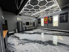 a large room with black and white marble flooring