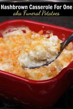 a spoon full of mashed potatoes in a red casserole dish with the words hashbrown casserole for one