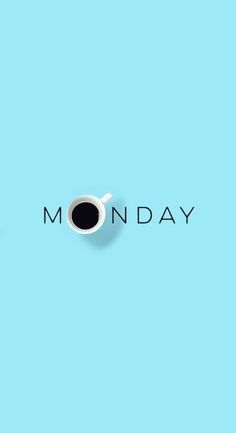 a cup of coffee with the word monday written on it in black and white, against a blue background