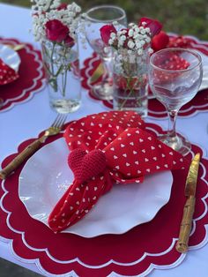 red and white table setting with polka dot napkins