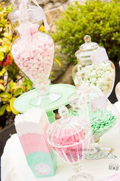 a table topped with lots of candy and candies on top of eachother