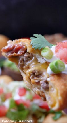 A burrito being held up with a bite taken out of it. Fried Burritos, Ground Beef Refried Beans, Beef Burrito Recipe, Guacamole Chips, Beans And Cheese, Seasoned Ground Beef, Mexican Side Dishes, Tacos And Burritos, Burritos Recipe