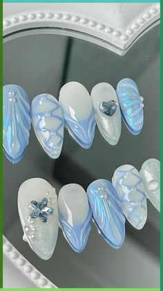 Looking for a classic manicure color combo? Check out these ideas for pink and white nails. Futuristic Nail Art Designs, Blue Aesthetic Nails Almond, Iridescent Nails Blue, Blue Coquette Nails, Cinderella Nail Art, Soft Blue Nails, Blue Mermaid Nails, Aquatic Nails, Jellyfish Nail Art