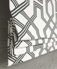 the black and white pattern is on the wall