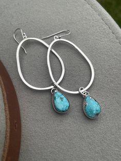 This is a pair of handcrafted sterling silver and Whitewater Turquoise dangle earrings - a gorgeous statement earring (that is relatively lightweight!) that flaunts a stunning pair of whitewater turquoise stones. The stones remind me of the ocean :)  These earrings are incredibly versatile - great dressing up an outfit with a T-shirt and jeans, and also a perfect jewelry option for dressing up for a special event! Dangling from sterling silver teardrops, these Whitewater turquoise stones add a p Turquoise Drop Bohemian Jewelry, Sterling Silver Teardrop Jewelry With Natural Stones, Turquoise Bohemian Drop Jewelry, Bohemian Turquoise Drop Jewelry, Turquoise Drop Sterling Silver Jewelry, Turquoise Hand Forged Drop Earrings, Artisan Turquoise Drop Earrings Jewelry, Handmade Turquoise Drop Jewelry, Nickel-free Teardrop Turquoise Jewelry