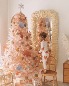 We’ve gathered the coolest pastel Christmas tree decor ideas to begin with, as Christmas trees are the main decorations and focal points. Rainbow Chair, Anthropologie Christmas Tree, Anthropologie Holiday