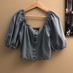 Nwt Taxi Women's Denim Button Down Crop Top. Size L Large. Denim Color/Design. Balloon 3/4 Sleeves - Could Be Worn Off Shoulders. Stretch. 100% Cotton. Machine Wash. Brand New With Tags, Never Worn. See Photos For Approximate Measurements (Measurements Taken In Front Of A Big Window In Sunlight) *Disclosure For All Items In My Closet* - Pet Free/Smoke Free House - Color May Show On Your Screen As Different Shades On Different Devices - Some Items May Have Small Pinholes From Security Sensors Fro Design Balloon, Button Down Crop Top, Off Shoulder Sleeves, House Color, Big Windows, Denim Color, Denim Button Down, Colored Denim, Shoulder Sleeve