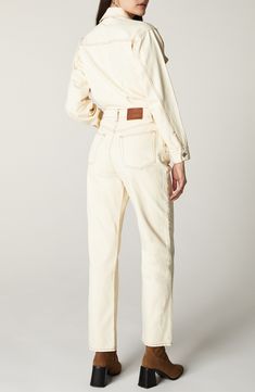 Break through any style rut with this one-and-done nonstretch-denim jumpsuit cast in a chic off-white hue. 31" inseam Front button closure Spread collar Long sleeves with button cuffs Chest flap-patch pockets; five-pocket style 100% cotton Machine wash, line dry Imported Straight Leg Jumpsuits And Rompers For Workwear In Spring, Chic Straight Leg Jumpsuit For Spring, Chic Straight Leg Denim Jumpsuit For Work, Chic Cream Jumpsuits And Rompers With Pockets, Chic Relaxed Fit Denim Jumpsuit For Work, Cream Cotton Jumpsuits And Rompers Relaxed Fit, White Fitted Cotton Denim Jumpsuit, Chic High Rise Jumpsuits And Rompers For Work, Chic High Rise Jumpsuits For Workwear