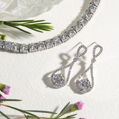 Bridal accessories, silver jewelry, teardrop earrings, cubic zirconia earrings, vintage earrings, silver dangle earrings ► Spend $200 | Receive 10% OFF Your Order with Code: 10OFF200 ► Please note in your order when your wedding date is Dainty long drops paved with Cubic Zirconia crystals. Complete the look with swirling pin curls in a mesmerizing pony. MATERIALS & MEASUREMENTS - 18K White Gold plated - Cubic Zirconia Pave Crystals - Hypoallergenic, lead & nickel free - Post Back Earring Crystal Drop Earrings Wedding, Drop Earrings Bridal, Silver Bridal Earrings, Bridal Statement Earrings, Dangle Earrings Silver, Bridal Earrings Drop, Pin Curls, Back Necklace, Round Pendant Necklace