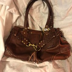 Beautiful Saddle Brown All Leather Coach Handbag. Great Condition, Non Smoking House. Leather Rectangular Hobo Bag With Branded Hardware, Leather Satchel With Branded Hardware, Rectangular Leather Hobo Bag With Branded Hardware, Leather Satchel Bags With Branded Hardware, Leather Bags With Gold-tone Hardware For Errands, Formal Satchel Bag With Braided Handles, Designer Handheld Bags With Braided Handles, Coach Leather Hobo Bag With Gold-tone Hardware, Brown Satchel Shoulder Bag With Branded Hardware