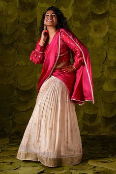 Rose dust off white lehenga with circular gold zari buttis, embroidered waistband and hem. Paired with a sangria pink blouse with paisley buttis and dupatta. - Aza Fashions Off White Lehenga, White Lehenga, Embroidered Lehenga, Pink Blouse, Embroidered Silk, Sangria, Set For Women, Aza Fashion, Lehenga