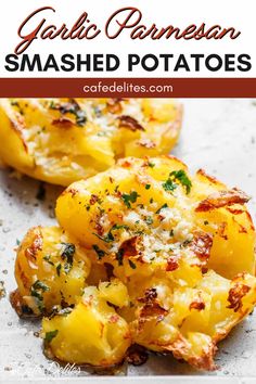 garlic parmesan smashed potatoes on a baking sheet with text overlay that reads garlic parmesan smashed potatoes