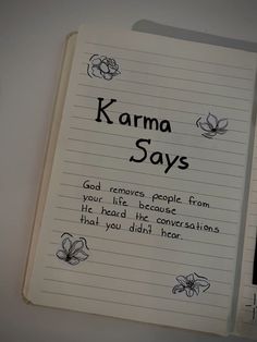 an open notebook with writing on it that says karma says god removes people from your life because he had the conversations that you didn't