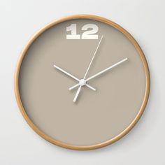 a clock with the number twelve eleven on it's face is shown in front of a white background