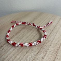 A Handmade Bracelet Or Anklet Woven With Shades Of White And Red Colors. A Friendship Or Statement Bracelet Perfect For This Summer! Approx. 9 Inches/ 30 Centimeters Long. 10 Woven Bracelets For $25. White Casual Bracelets For Valentine's Day, Casual White Bracelets For Valentine's Day, White Casual Friendship Bracelets For Valentine's Day, Casual White Friendship Bracelets For Valentine's Day, Adjustable White Friendship Bracelets For Valentine's Day, Boho Charm Bracelet, Coach Earrings, Alex And Ani Bangles, Simple Bangle