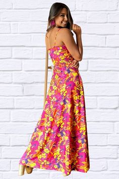 ✨ Make a stylish statement with our Twisted Printed V-Neck Cami Dress! 💃 Whether it's a garden party or a night out, this dress has got you covered. Shop now and experience the perfect blend of fashion and comfort! #HeadTurner #EffortlessChic Tropical Maxi Dress With Spaghetti Straps For Spring, Spring Tropical Maxi Dress With Spaghetti Straps, Tropical Spaghetti Strap Maxi Dress For Spring, Tropical Floral Print Maxi Dress With Spaghetti Straps, Tropical Spaghetti Straps Dresses For Party, Spring Tropical Dress With Adjustable Straps, Kimono Sweater, Bold Floral Print, Dress Pant