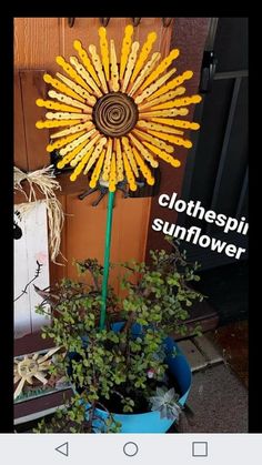 a sunflower made out of sticks in a pot