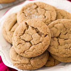 a white plate topped with cookies on top of a table