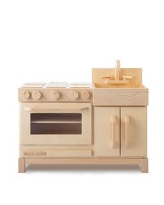 a wooden toy stove and oven on a white background