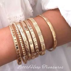 This bracelets come as set (as pictured) These stacking bangles are perfect for any outfit. perfect for gift, Treat yourself or a loved one. These beautiful set of bracelets will enhance any outfit. ✔️Style 1 This bracelets come as set of 7.  Delicate eye catchers Bangle set! These bangles gold plated with beautiful textures are perfect for any outfit, and they are great bangle set because they are adjustable will fit most wrist size!  You can wear them as stacking bangles or single bracelet! th Bangle Bracelets Gold Simple For Women, Bangle Aesthetic, Women Gold Bangles, Future Accessories, Simple Gold Bangle, Summer Basket, Golden Bangles, Jewelry Stack, Stacking Bangles