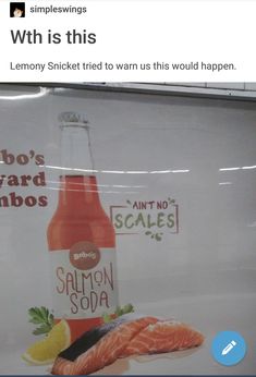 an advertisement for salmon soda is shown on the side of a store display window,