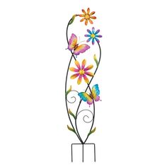 a metal sculpture with colorful flowers and butterflies on it's sides, against a white background