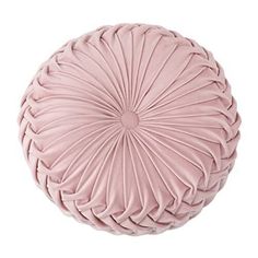 an image of a pink round pillow on a white background and it looks like pleated fabric