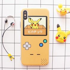 an iphone case with a pikachu game on it next to some pokemon figurines