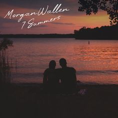 two people are sitting on the beach watching the sun go down and there is an advertisement for morgan - walen's summer