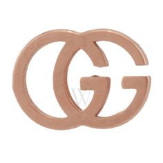 a pair of earrings with the letter g in gold plated brass, set against a white background