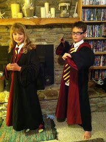 two children dressed up in harry potter costumes