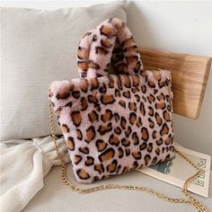 Brand Name: DKQWAITHandbags Type: Shoulder BagsTypes of bags: Shoulder Crossbody BagsMain Material: Faux FurLining Material: PolyesterShape: FLAPPlace Of Origin: GUANG DONG ProvinceOrigin: CN(Origin)Hardness: SoftPattern Type: LeopardInterior: Cell Phone PocketDecoration: NONEExterior: NONEOccasion: VersatileClosure Type: HaspGender: WOMENStyle: FashionModel Number: 465465Number of Handles/Straps: Single Fluffy Bags, Female Leopard, Winter Handbags, Leopard Tote, Luxury Tote Bags, Leopard Bag, Perfect Gift For Girlfriend, Bag Prada, Fur Bag