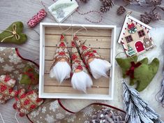 christmas decorations are displayed on a table