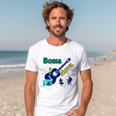 Transport yourself to the sultry streets of Rio de Janeiro with our Bossa Nova t-shirt. This stylish and comfortable tee features a beautiful graphic of a guitar, a colorful macaw, a postage stamp of Rio de Janeiro, a singer, and a guitarist. Whether you're a fan of the smooth Bossa Nova sound or just appreciate the vibrant culture of Brazil, this shirt is sure to make a statement. Perfect for music lovers, travelers, or anyone looking to add a touch of Brazilian flair to their wardrobe. Order yours today and bring a little bit of Rio into your everyday life. This classic unisex jersey short sleeve tee fits like a well-loved favorite. Soft cotton and quality print make users fall in love with it over and over again. These t-shirts have-ribbed knit collars to bolster shaping. The shoulders Music-themed Short Sleeve Top With Front Print, Pre-shrunk Music-themed T-shirt For Summer, Music-themed Summer T-shirt, Music-themed Short Sleeve T-shirt With Front Print, Music-themed Screen Print T-shirt For Summer, Brazil Culture, Latin Music, Bossa Nova, Music Lover