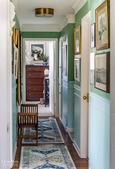 Walls With Chair Rail, Two Toned Walls, Hallway Makeover Before And After, Gallery Wall Hallway, Eclectic Hallway, Hallway Wall Colors, Colorful Gallery Wall, Bright Hallway, Blue Hallway